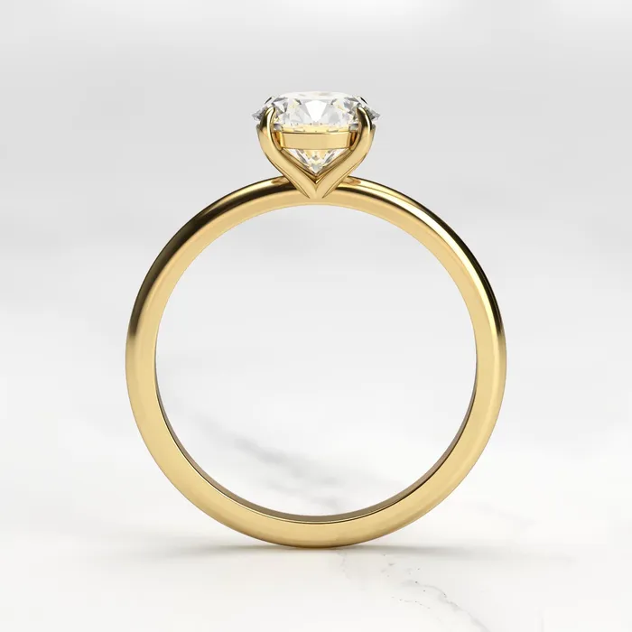 Rings Capucinne Round Tapered Solitaire Diamond Ring
