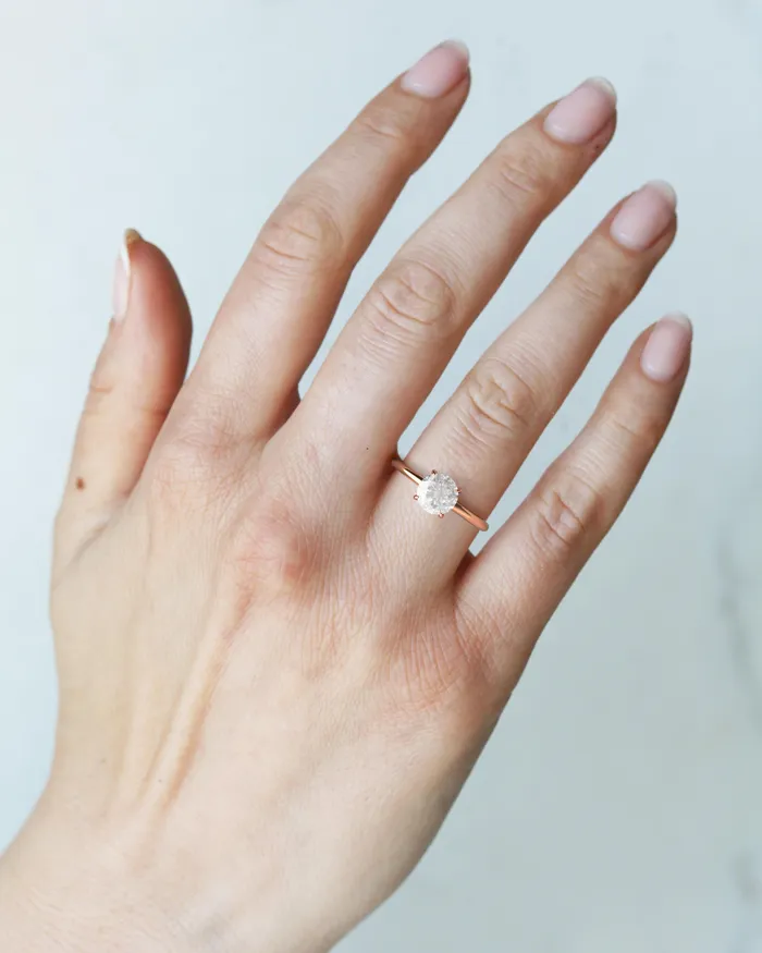 Rings Capucinne Round Tapered Solitaire Diamond Ring