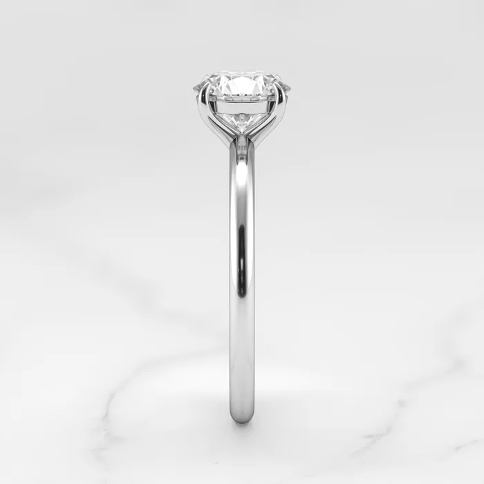 Rings Capucinne Round Tapered Solitaire Diamond Ring