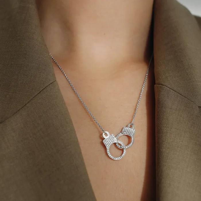 Necklaces Hand crafted in 18k white gold and set with 100 highquality round brilliant cut diamonds Love Lockdown Interlocking Diamond Necklace